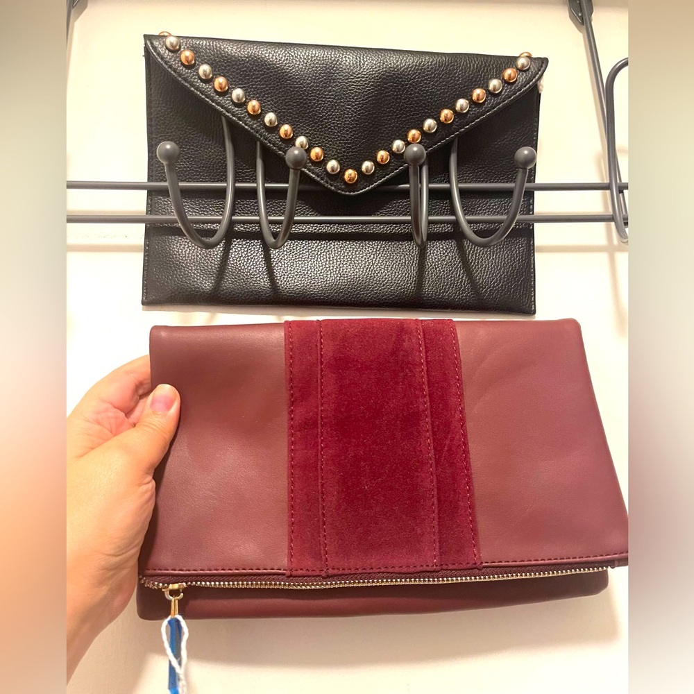 Clutch purses. Below the belt studded clutch. Summer & Rose burgundy clutch.